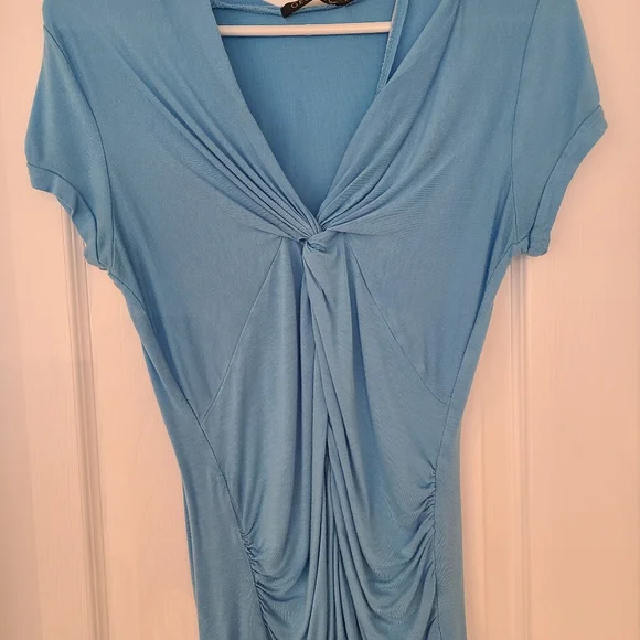 A size small casual shirt. - Picture 2 of 4